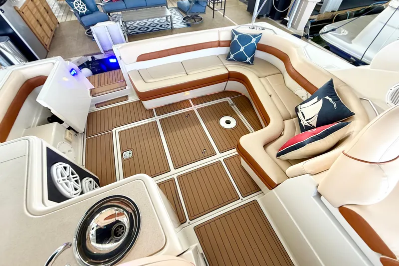 Slide: The Image of Luxurious interior of 1998 Regal Commodore 402 boat with plush seating and nautical decor. - 5