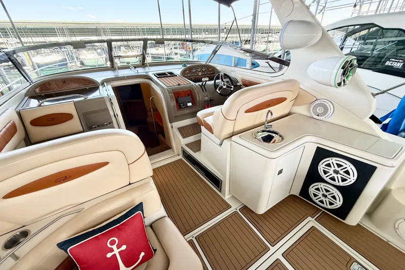 Slide: The Image of Luxurious 1998 Regal Commodore 402 yacht interior with plush seating and modern amenities. - 7