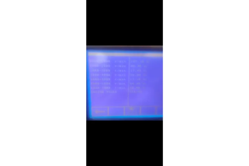 Slide: The Image of Blurry blue screen with text, possibly a menu or settings display. - 14