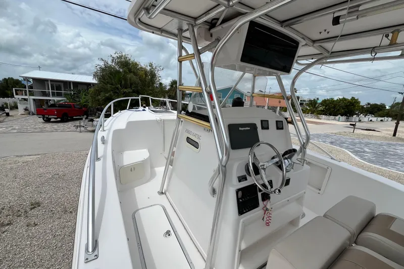 Slide: The Image of 2007 ProKat 2860 Center Console boat with steering wheel and navigation equipment. - 9