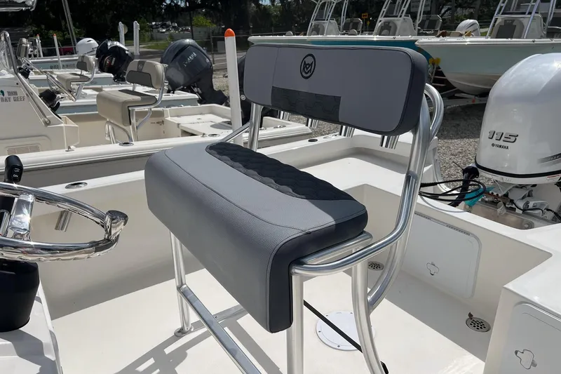 Slide: The Image of 2026 May-Craft 192 boat interior with Yamaha 115 engine, featuring a sleek seating area. - 9