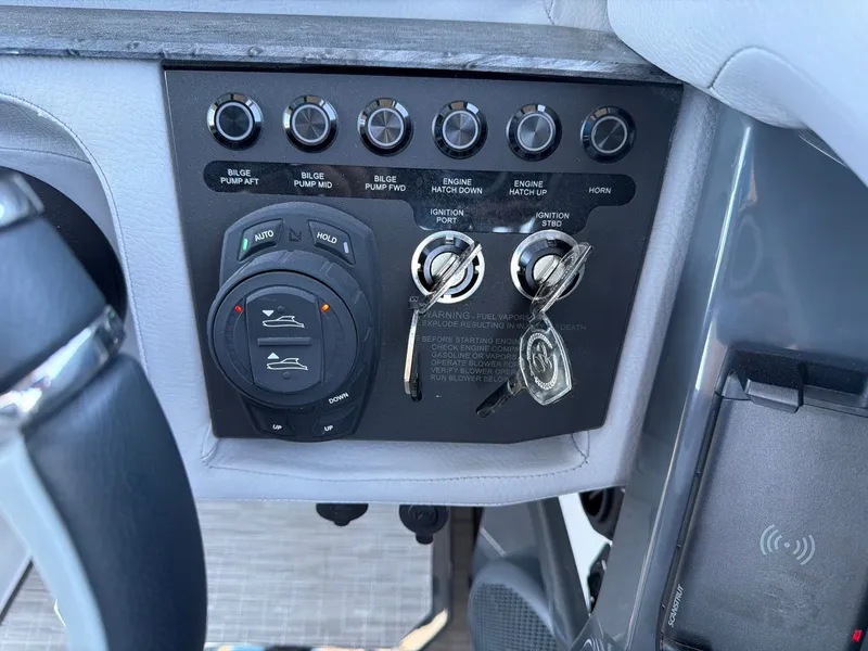 Slide: The Image of Dashboard of Cobalt R31 2026 with switches and ignition keys. - 33