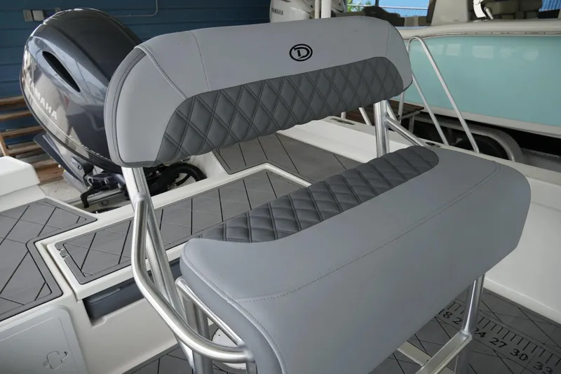 Slide: The Image of 2026 Defiance CATALINA 192 boat seat with diamond-patterned upholstery and Yamaha engine. - 14