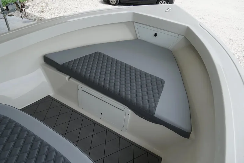 Slide: The Image of 2026 Defiance CATALINA 192 boat interior with gray cushioned seating. - 19