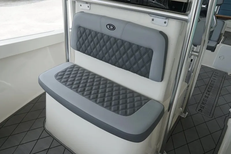 Slide: The Image of Gray cushioned seating on 2026 Defiance CATALINA 192 boat, featuring diamond stitching. - 21