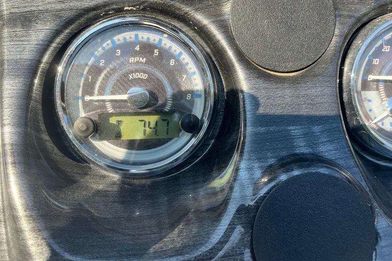 Slide: The Image of Close-up of Avalon LSZ 2585 QL 2023 dashboard showing RPM gauge at 747. - 15