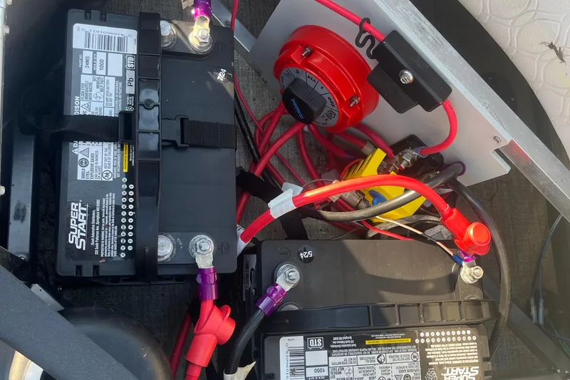 Slide: The Image of 2023 Avalon LSZ 2585 QL battery setup with wiring and connections. - 17