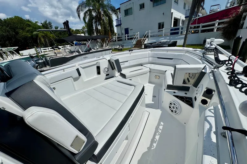 Slide: The Image of 2021 Blackfin 332 CC boat interior with spacious seating and modern amenities. - 27