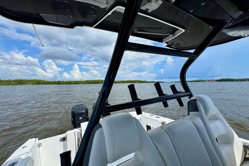 Slide: The Image of 2021 Blackfin 332 CC boat interior with lake view and blue sky. - 41