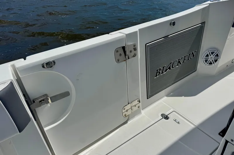 Slide: The Image of 2021 Blackfin 332 CC boat interior with branded panel and ocean view. - 46