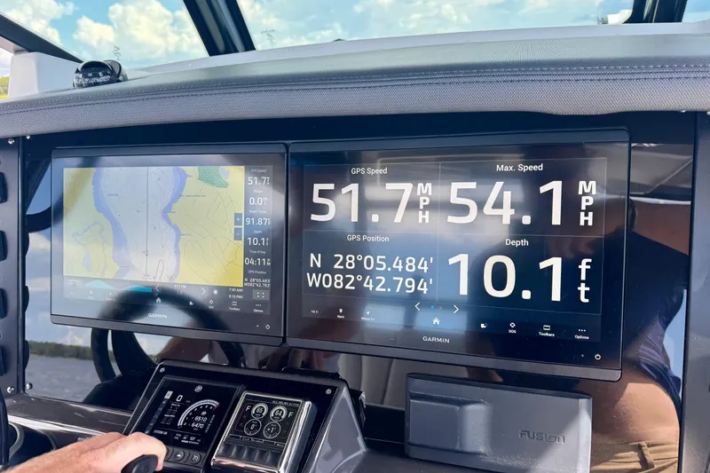 Slide: The Image of Dashboard of 2021 Blackfin 332 CC boat showing GPS speed and depth readings. - 56