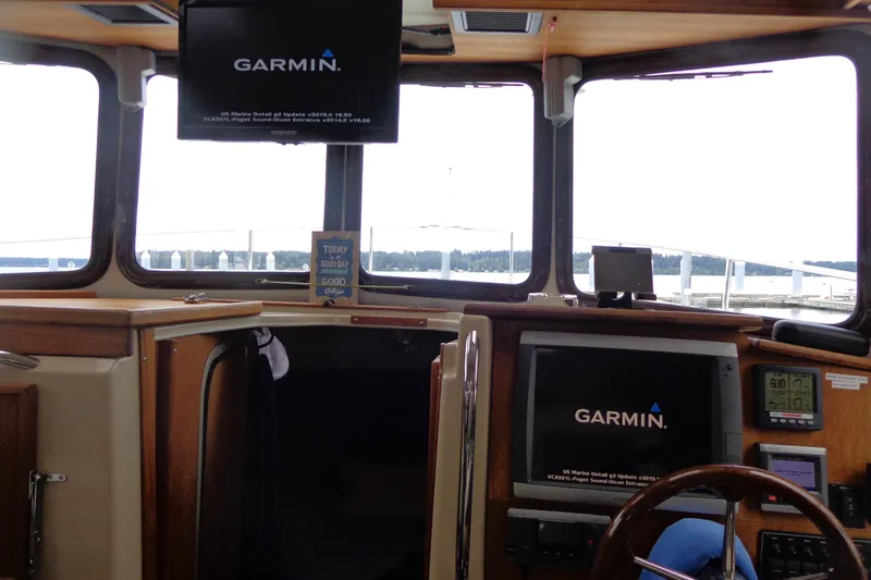 Slide: The Image of Interior of 2011 Ranger Tugs R-29 Classic boat with Garmin navigation system. - 30