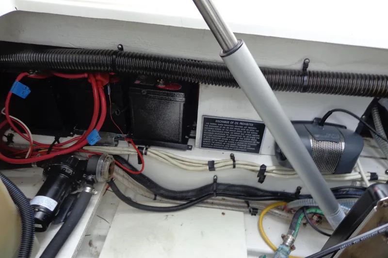 Slide: The Image of 2011 Ranger Tugs R-29 Classic engine compartment with wiring and components. - 50