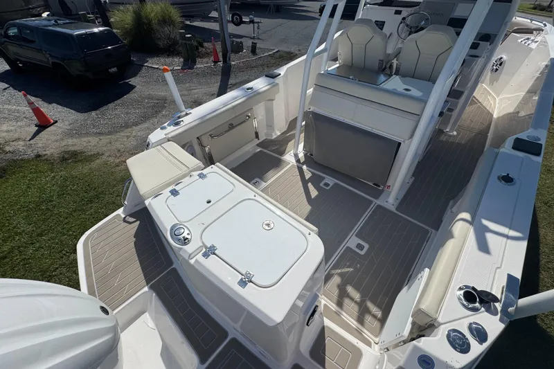 Slide: The Image of 2026 Solara S-250 CW boat interior with seating and control console. - 6