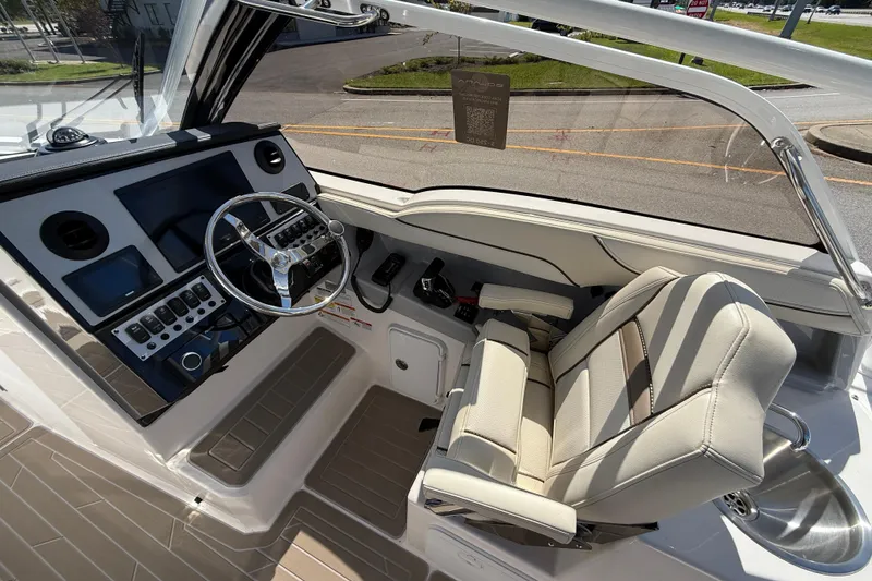 Slide: The Image of Interior of 2026 Solara S-250 DC boat with modern dashboard and comfortable seating. - 10