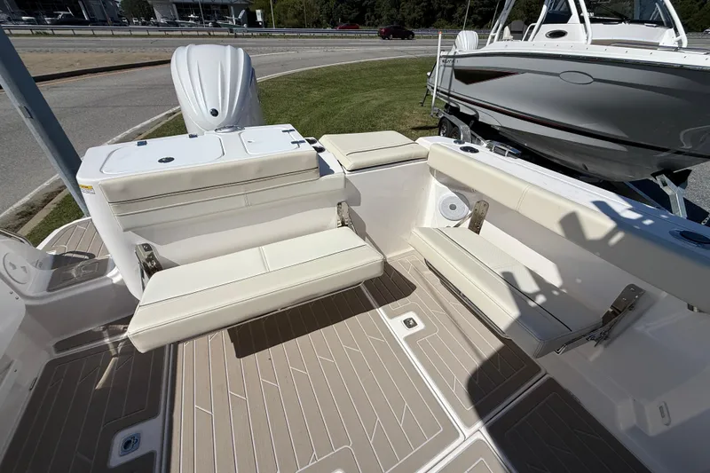 Slide: The Image of 2026 Solara S-250 DC boat interior with beige seating and modern design. - 6
