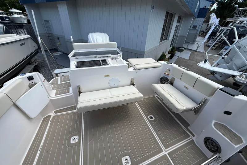 Slide: The Image of 2026 Solara S-250 C boat interior with cushioned seating and modern design. - 8