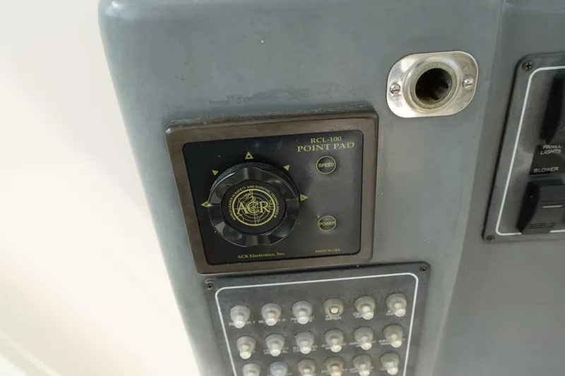 Slide: The Image of Control panel of a 1997 Pursuit 3400 Offshore boat with RCL-100 point pad. - 14