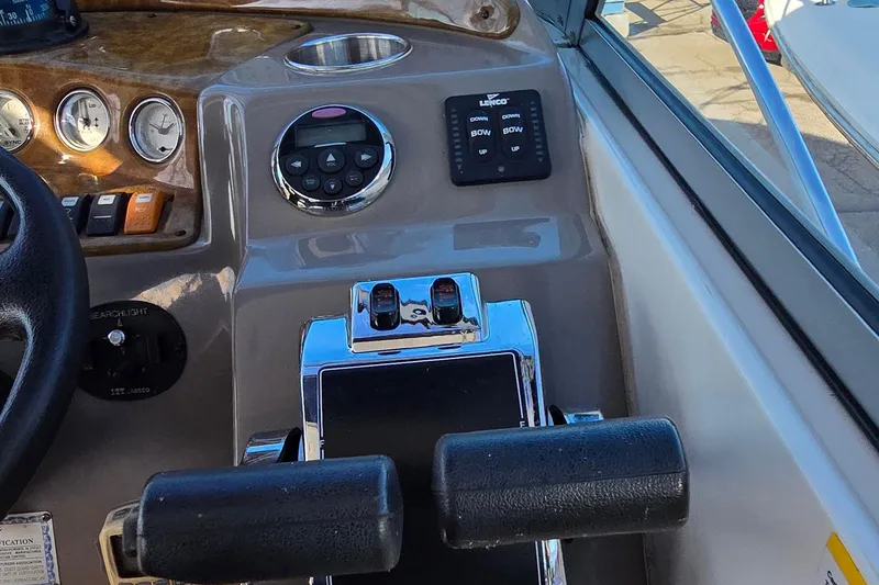Slide: The Image of 2007 Rinker 320 Express Cruiser dashboard with controls and gauges. - 10