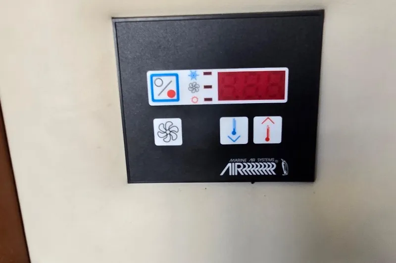 Slide: The Image of Control panel of Marine Air Systems on 2007 Rinker 320 Express Cruiser. - 37