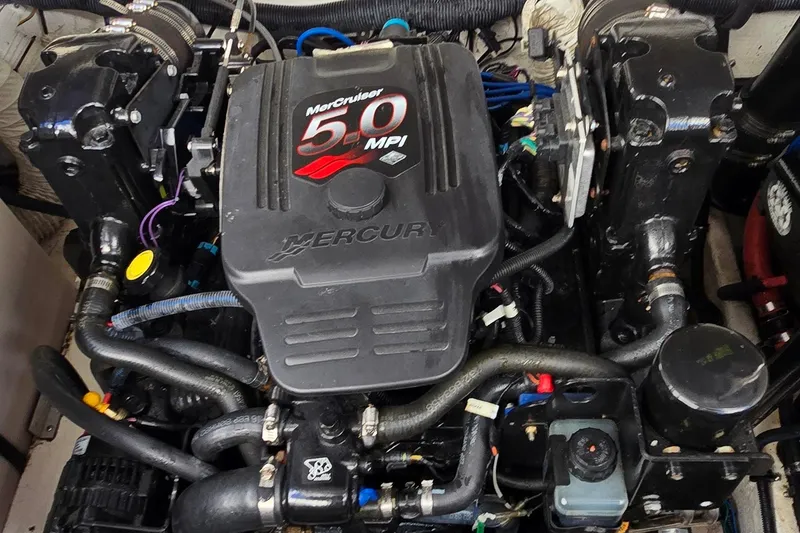 Slide: The Image of MerCruiser 5.0 MPI engine in 2007 Rinker 320 Express Cruiser boat. - 42