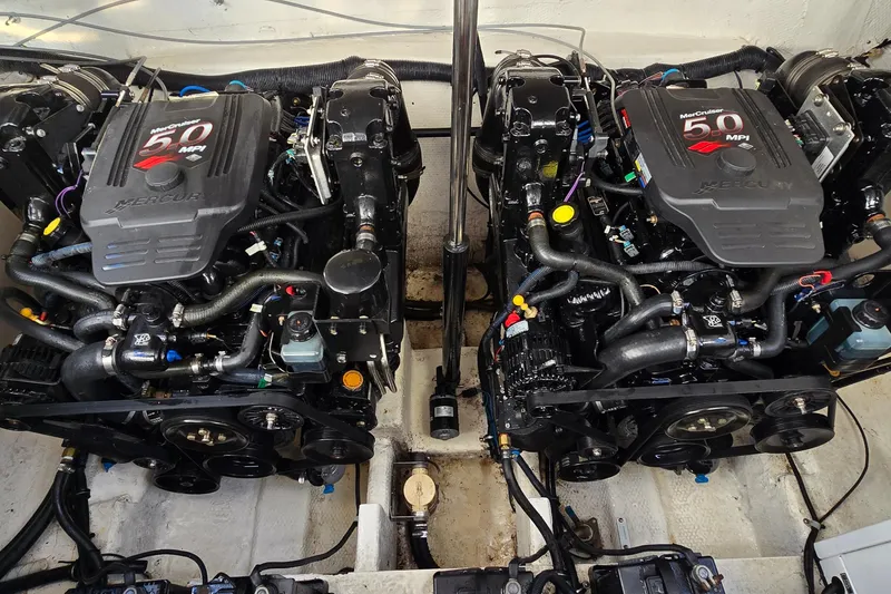 Slide: The Image of Twin MerCruiser 5.0 MPI engines in a 2007 Rinker 320 Express Cruiser. - 46
