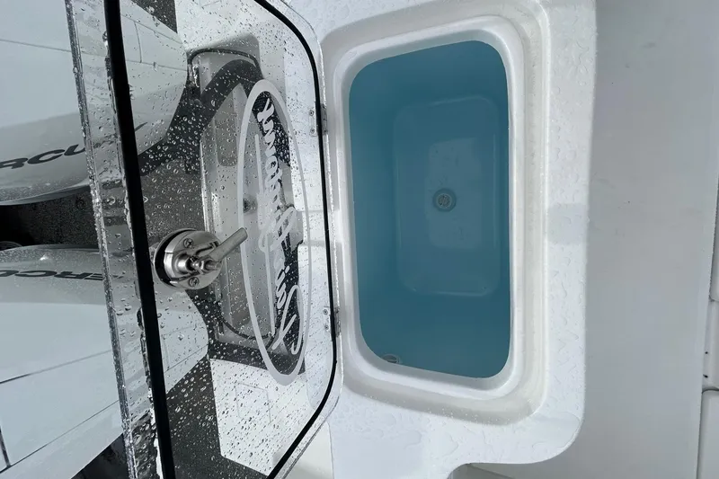 Slide: The Image of 2026 Pair Customs 27 Center Console with dual Mercury outboard engines on open water. - 8