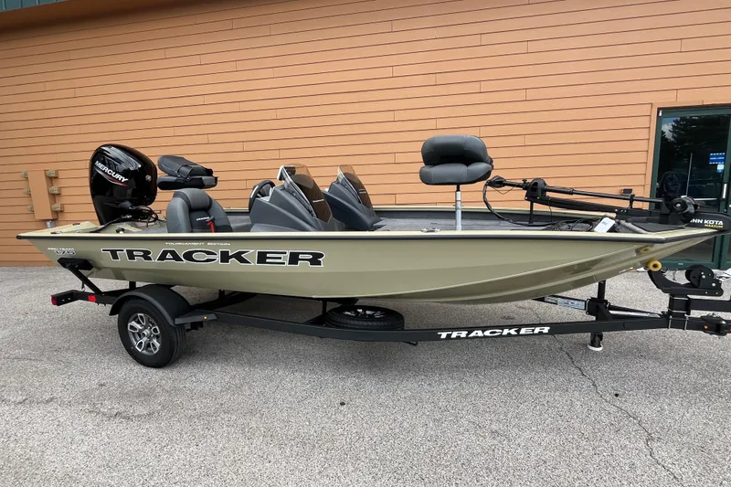 The Image of 2026 Tracker Pro Team 175 boat on trailer, parked outdoors. - 0