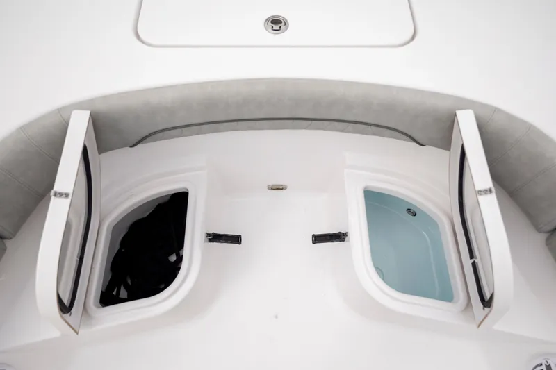 Slide: The Image of 2020 Sportsman Masters 267OE Bay Boat storage compartments, open and ready for use. - 19