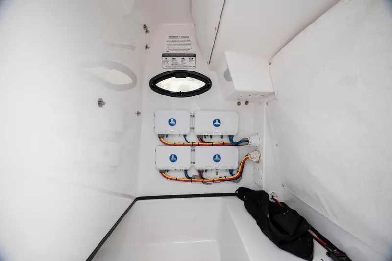 Slide: The Image of 2020 Sportsman Masters 267OE Bay Boat interior wiring and electrical components. - 21