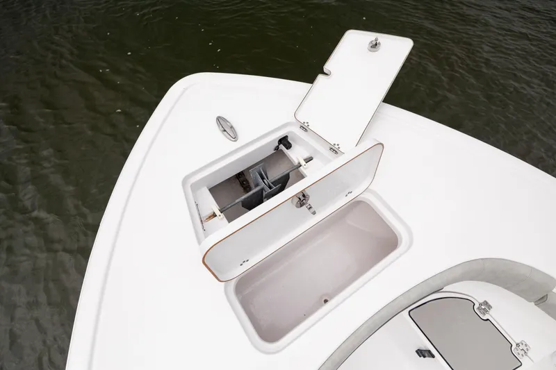 Slide: The Image of 2020 Sportsman Masters 267OE Bay Boat with open storage compartments on deck. - 25