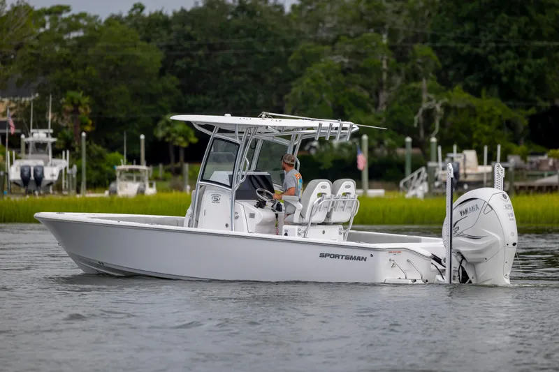 Slide: The Image of 2020 Sportsman Masters 267OE Bay Boat cruising on a calm waterway. - 8