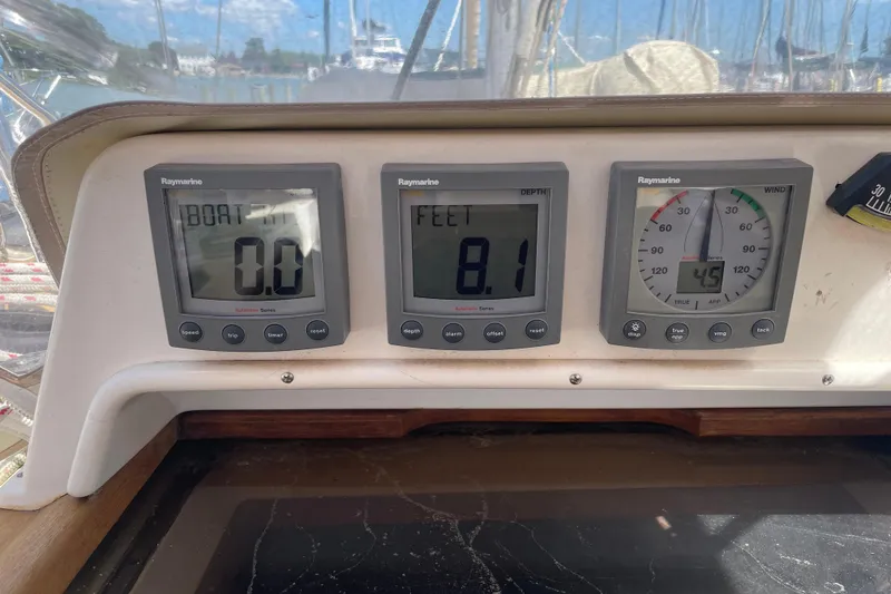 Slide: The Image of Tartan 3700 sailboat dashboard with Raymarine instruments, 2004 model. - 10