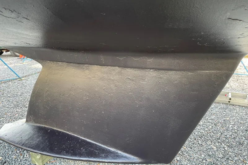 Slide: The Image of Close-up of the keel of a 2004 Tartan 3700 yacht. - 43