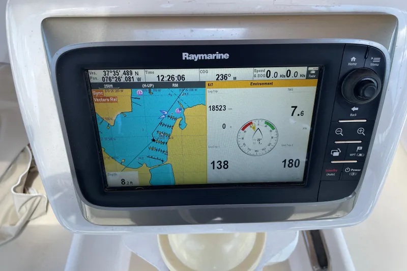 Slide: The Image of Raymarine navigation display on a 2004 Tartan 3700 sailboat, showing map and data. - 9