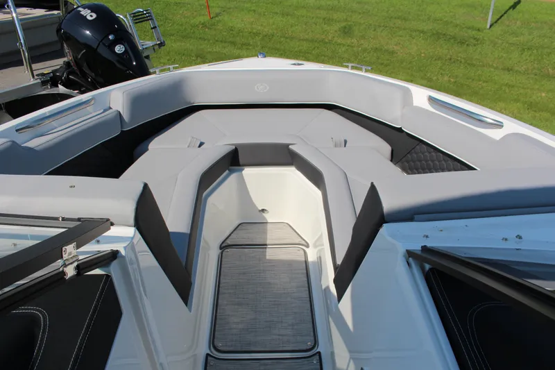 Slide: The Image of 2025 Cobalt R4 Surf boat interior with sleek seating and modern design. - 28