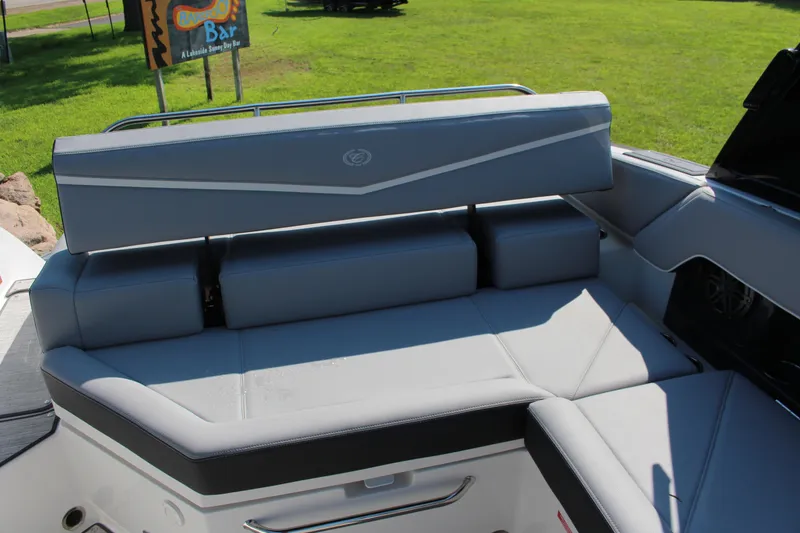 Slide: The Image of 2025 Cobalt R4 Surf boat interior with sleek gray seating and modern design. - 39