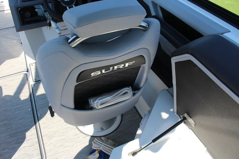Slide: The Image of 2025 Cobalt R4 Surf boat interior with "Surf" branded seat and modern design. - 41