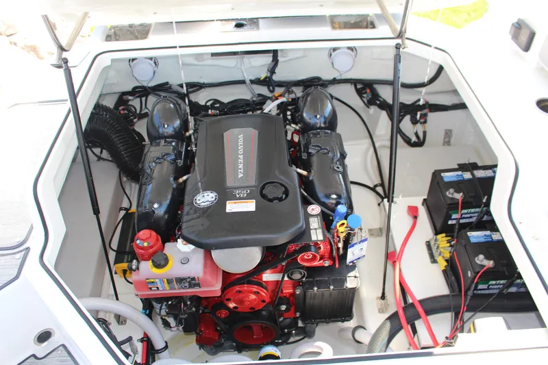 Slide: The Image of 2025 Cobalt R4 Surf boat engine compartment with Volvo Penta V8 engine. - 44