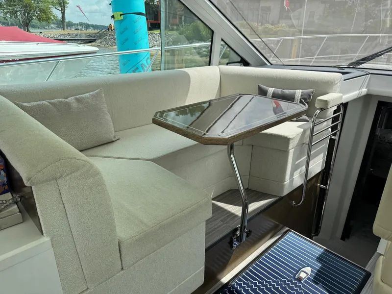 Slide: The Image of Luxurious interior seating area on a 2017 Cruisers Yachts 45 Cantius. - 19