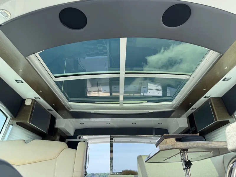 Slide: The Image of Interior view of 2017 Cruisers Yachts 45 Cantius with panoramic sunroof and modern design. - 25