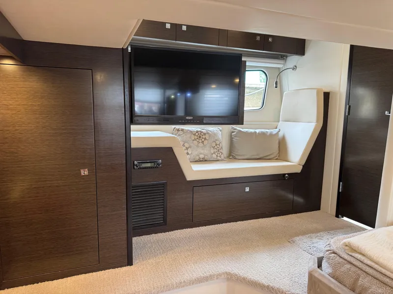 Slide: The Image of Luxurious interior of 2017 Cruisers Yachts 45 Cantius with TV and seating area. - 33