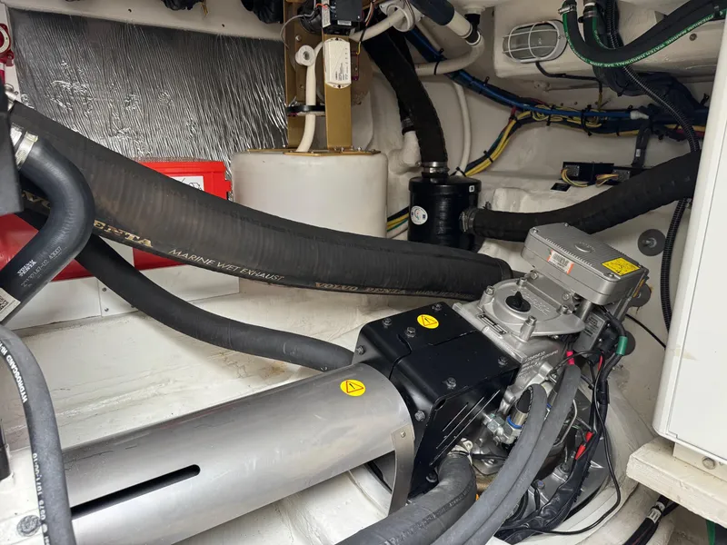 Slide: The Image of Engine room of 2017 Cruisers Yachts 45 Cantius with visible mechanical components. - 42