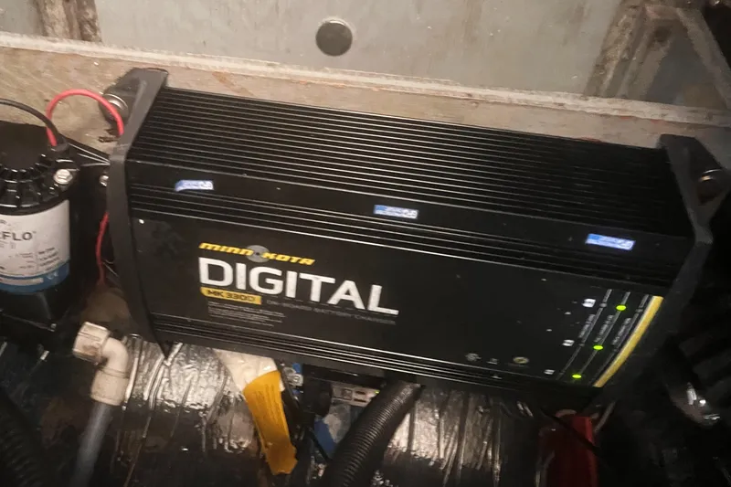 Slide: The Image of Minn Kota digital charger in 1994 Carver 350 boat engine compartment. - 45