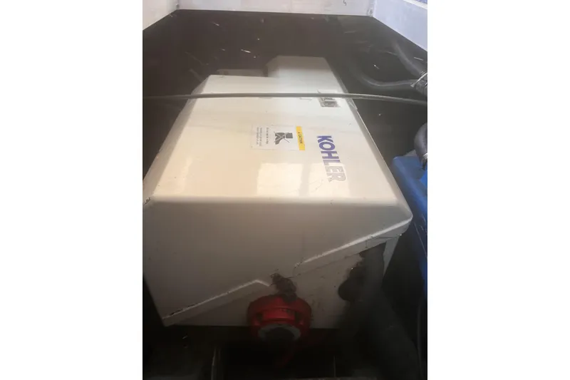 Slide: The Image of Kohler generator in a 1994 Carver 350 boat engine compartment. - 51