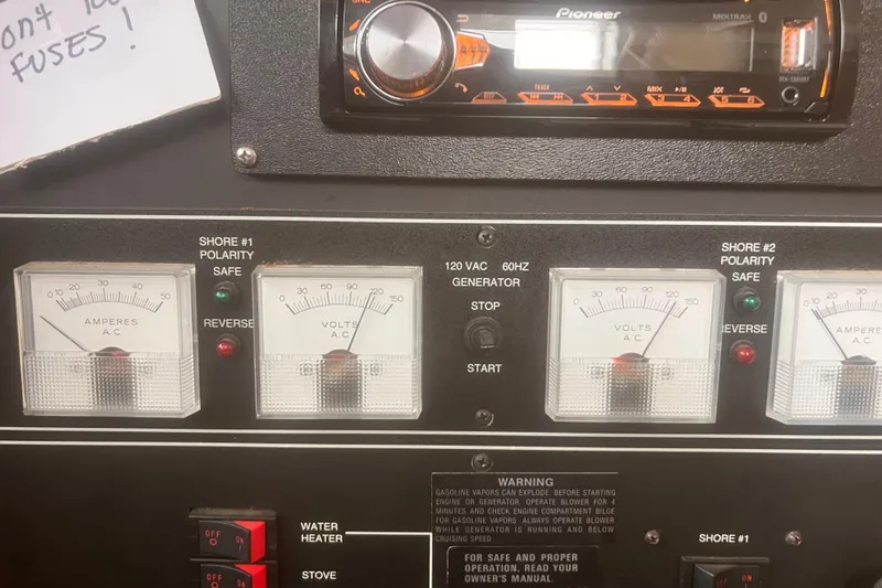 Slide: The Image of Control panel of a 1994 Carver 350 with gauges and Pioneer stereo system. - 17