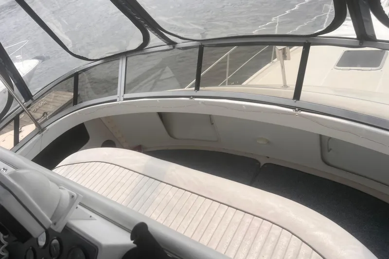 Slide: The Image of 1994 Carver 350 Aft Cabin Motor Yacht interior with helm and seating area. - 20