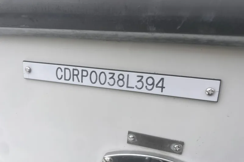 Slide: The Image of 1994 Carver 350 boat hull identification number: CDRP0038L394. - 54