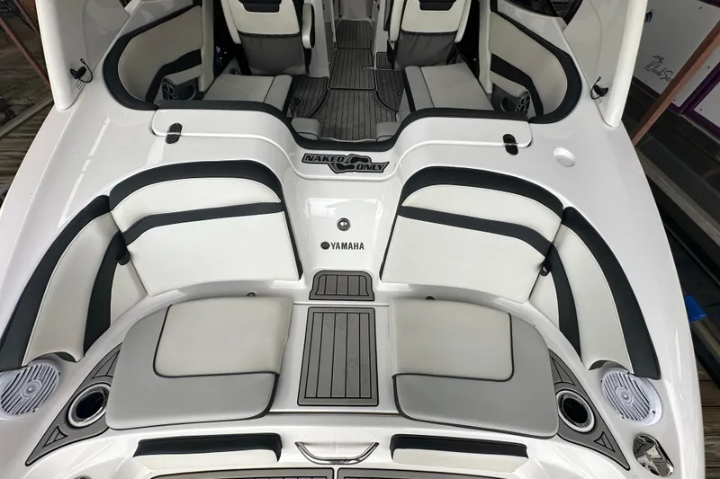 Slide: The Image of 2020 Yamaha Boats 242SE interior with sleek seating and modern design. - 15