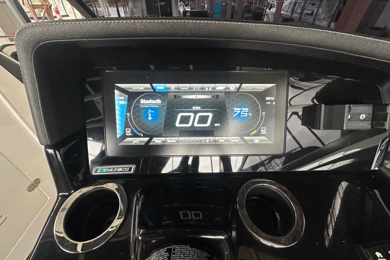 Slide: The Image of Yamaha Boats 2020 242SE dashboard with digital display and Bluetooth connectivity. - 19